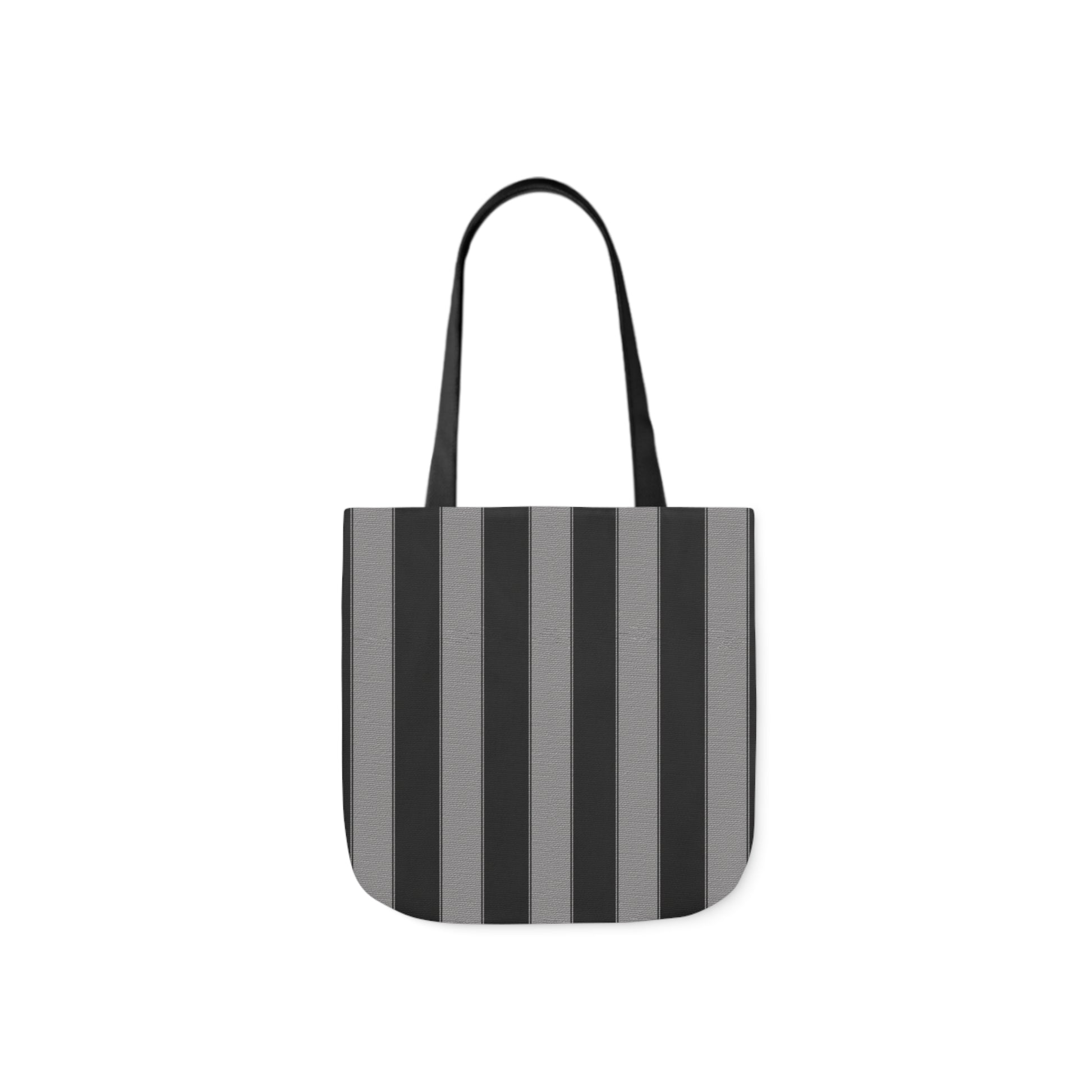 A canvas shoulder tote bag with a design of black and grey stripes pattern.