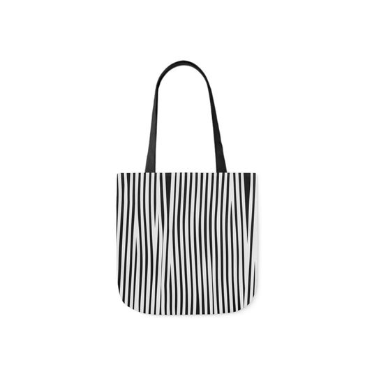 A canvas shoulder tote bag with a design of black and white zebra stripes pattern. The bag straps are black.