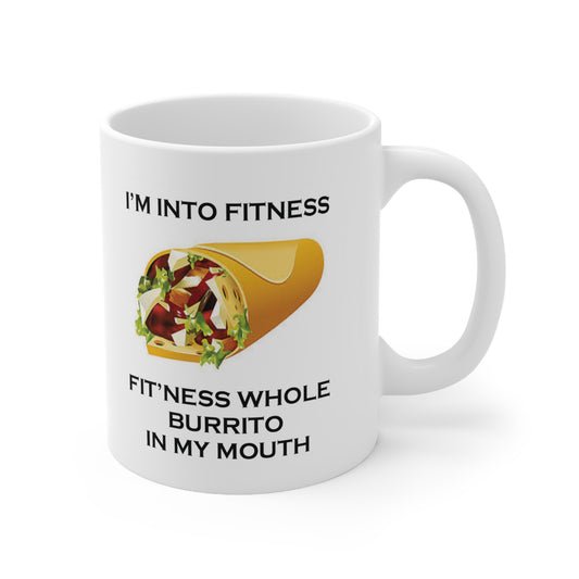 A white ceramic coffee mug with a design of a burrito and the funny quote: I'm Into Fitness, Fit'ness Whole Burrito In My Mouth