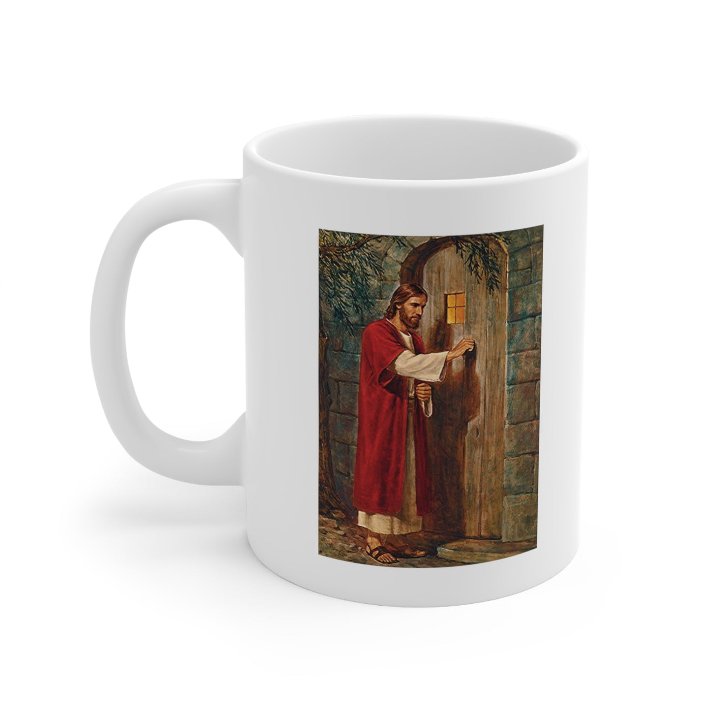 A white ceramic coffee mug with a painting of Jesus Christ knocking at the door