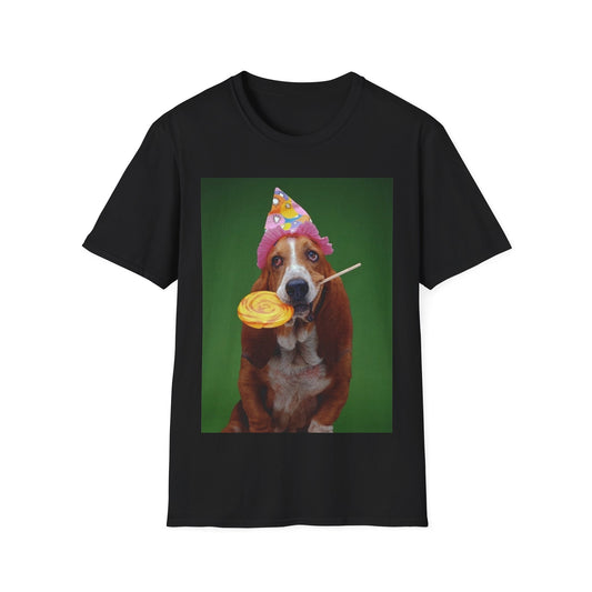 A black t-shirt with a photo of a Basset hound dog wearing a party hat, with a yellow lollipop in her mouth