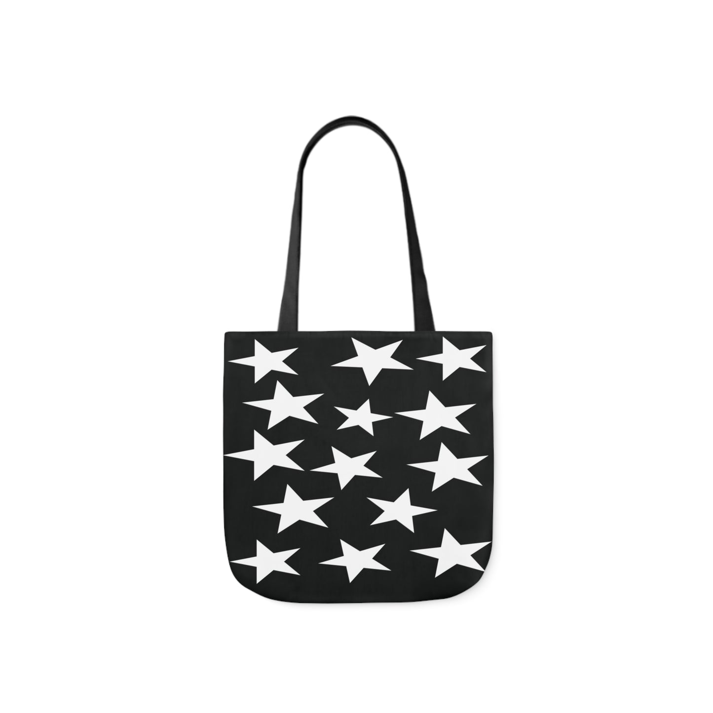 A canvas shoulder tote bag with a design of white star pattern on a black background.