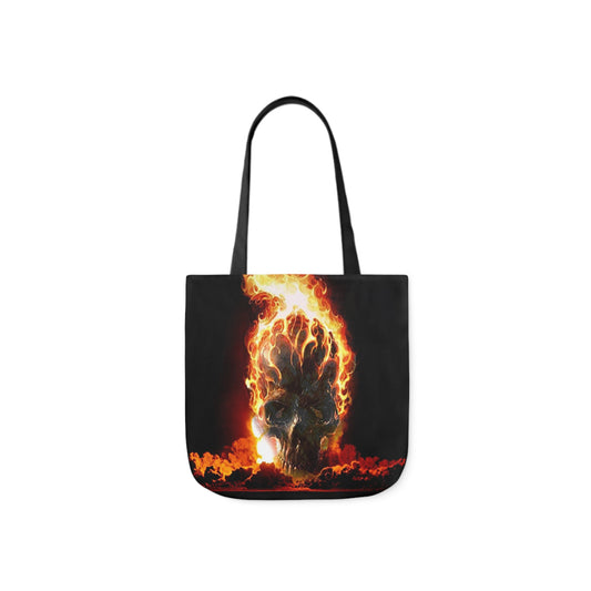 A canvas shoulder tote bag with a design of a flaming skull.