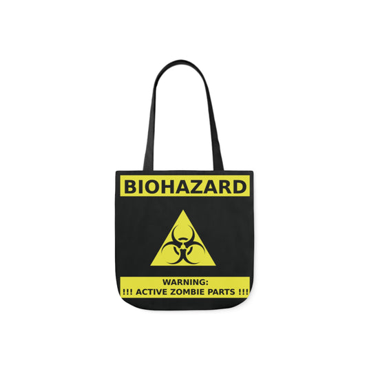 A canvas shoulder tote bag with a design of a sign reading: Biohazard. Warning: Active Zombie Parts.