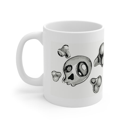 A white ceramic coffee mug with a design of a skull and crossbones