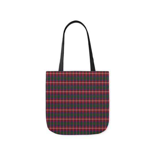 A canvas tote bag with a red, blue and green tartan pattern. The tote bag handles are black.