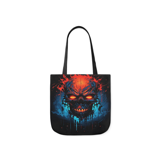 A canvas shoulder tote bag with a design of a demonic skull from Hell, blazing with fire.