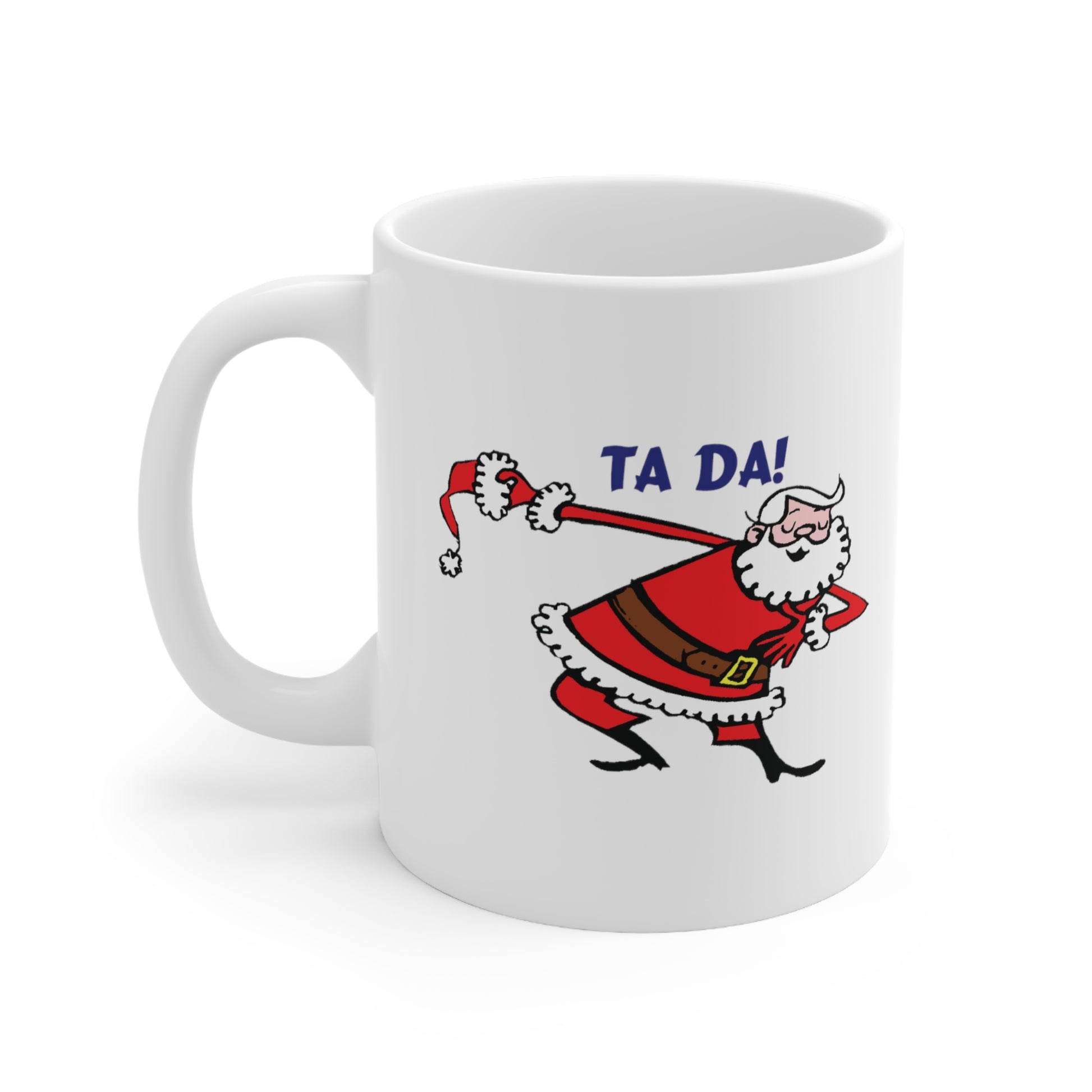 A white ceramic coffee mug with a design of a cartoon Santa Claus taking a bow and saying: Ta Da!