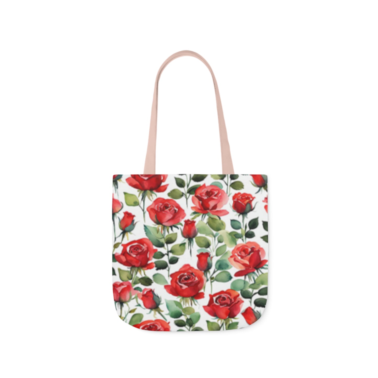 A canvas tote bag with a red rose pattern. The tote bag handles are light pink