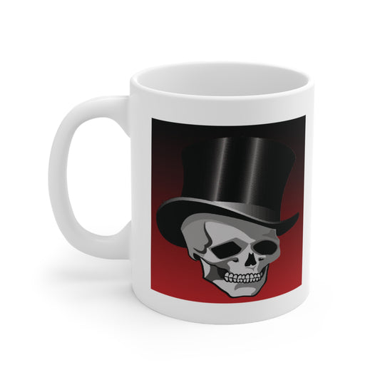 A white ceramic coffee mug with a design of a skull in a top hat with a red and black background