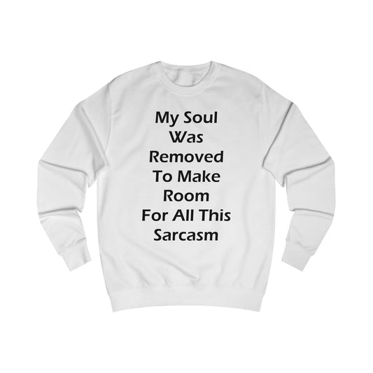 A white sweatshirt with a design of a funny quote: My Soul Was Removed To Make Room For All This Sarcasm