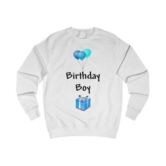 A white sweatshirt with a design of blue balloons and a blue present with the words: Birthday Boy