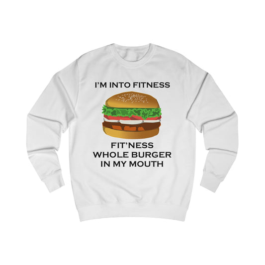 A white sweatshirt with a design of a burger with the funny quote: I'm Into Fitness, Fit'ness Whole Burger In My Mouth