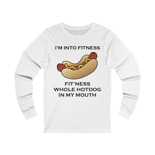 A white long sleeve jersey t-shirt with a design of a hot dog with a funny quote: i'm Into Fitness, Fit'ness Whole Hotdog In My Mouth