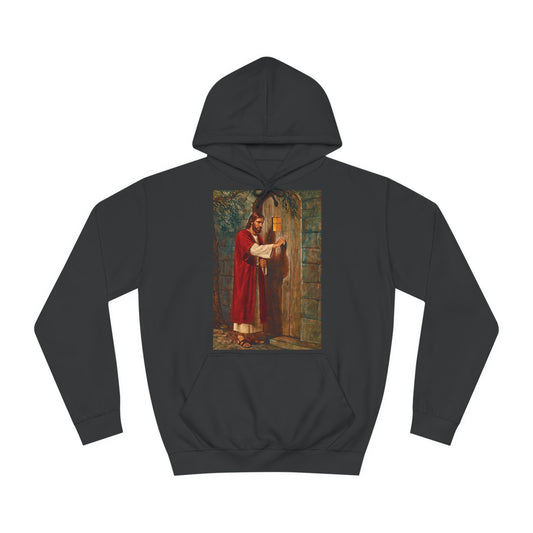 A black hoodie sweatshirt with a design of a classical painting of Jesus Christ knocking at the door.